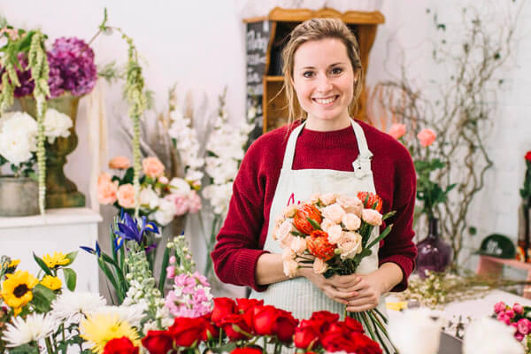 An image of a florist using billing software